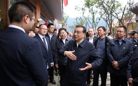 李克強為什么改變行程隨機考察一家農村信用社